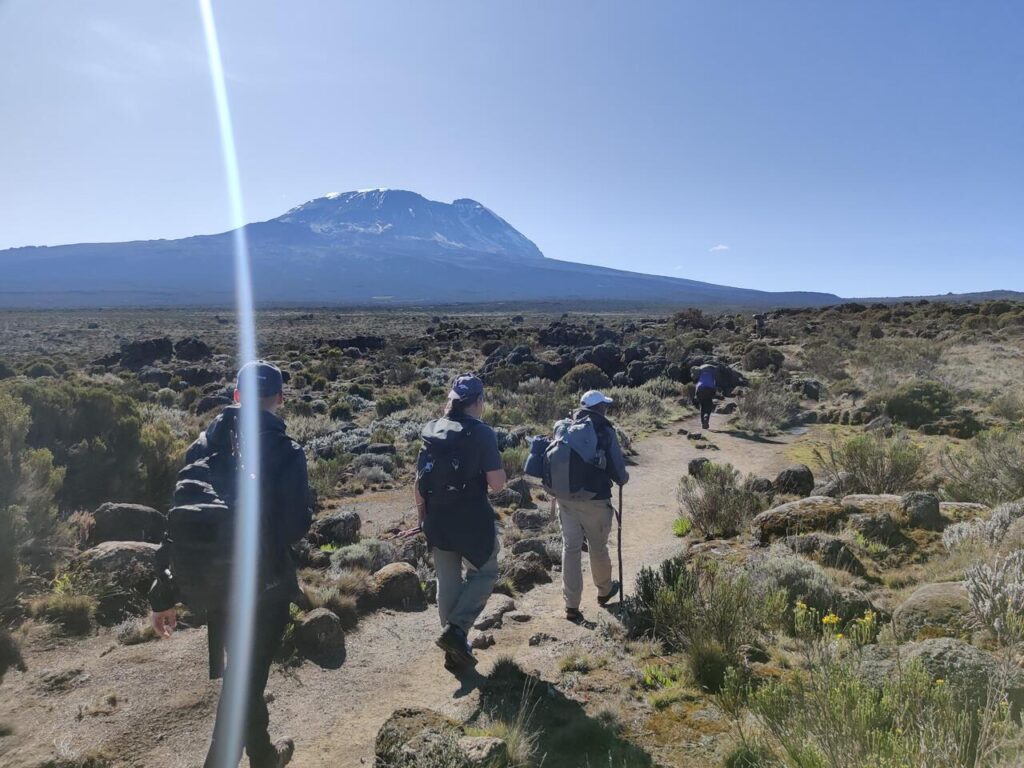 A group of hikers trekking the 6 Days Machame Route to the summit of Mt. Kilimanjaro