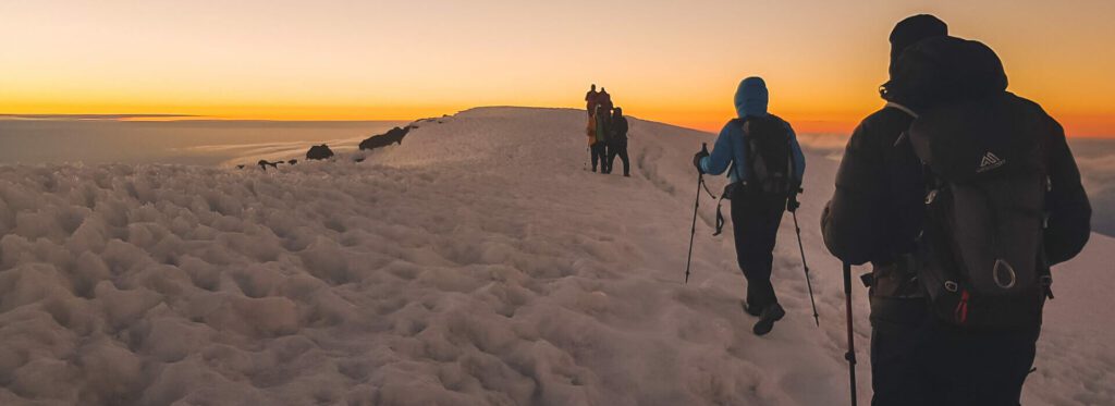 Kilimanjaro tours 2025 hikers on the 7 Days Machame route near summit