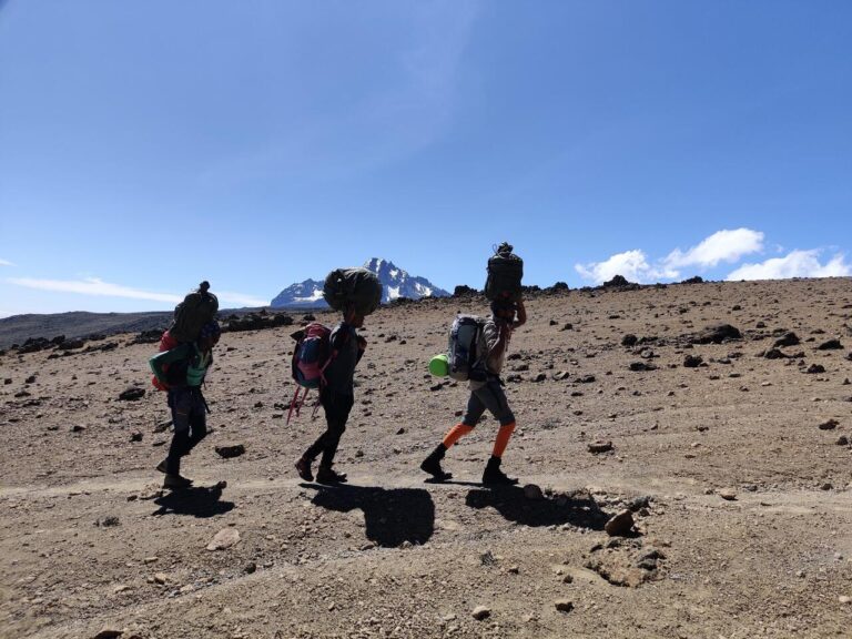 3 porters on kilimanjaro