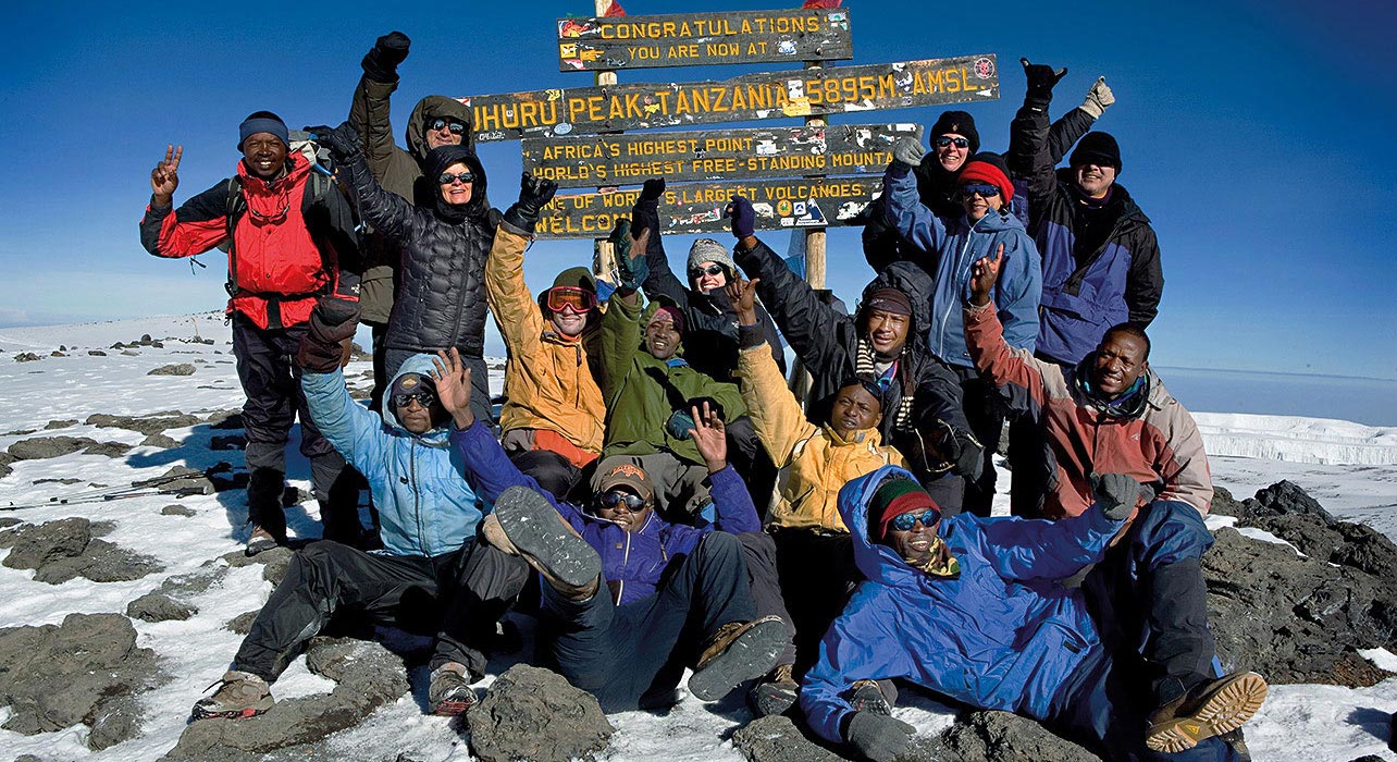 Our large group of hikers at the summit of Mt. Kilimanjaro