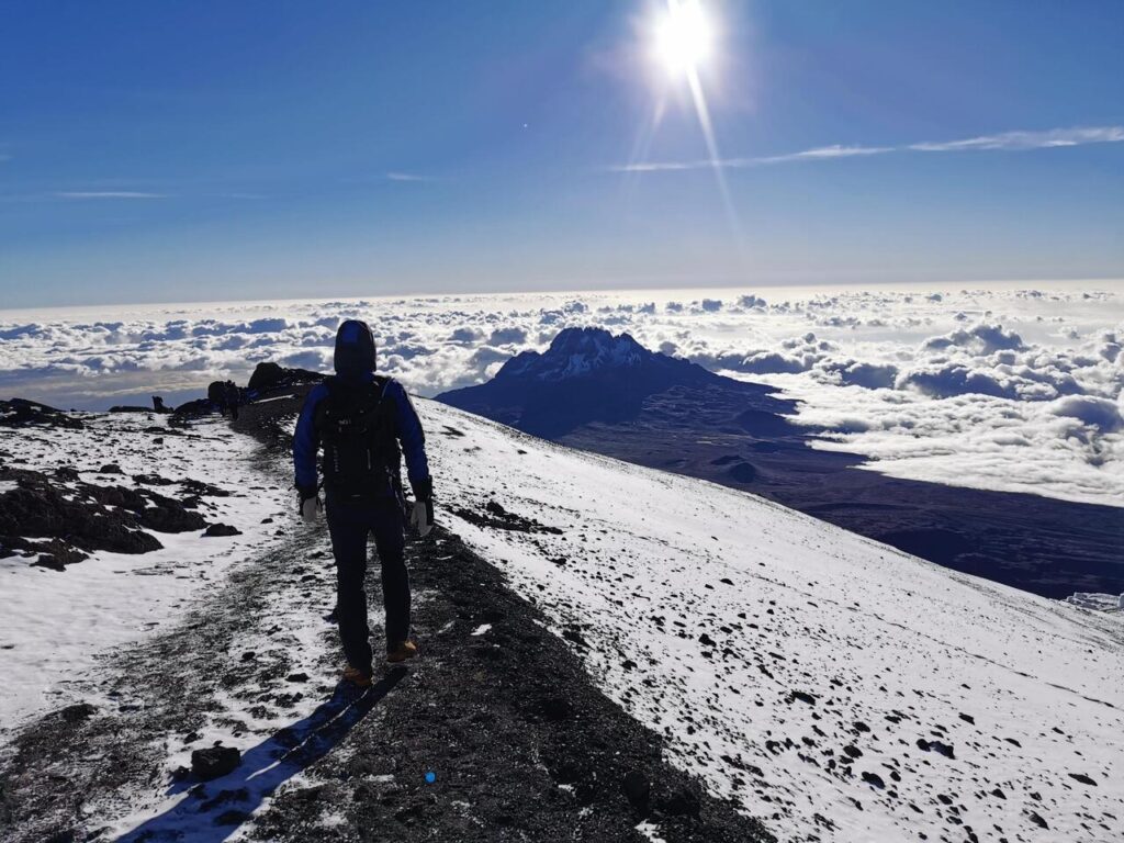 a hiker near mt. kilimanjaro summit