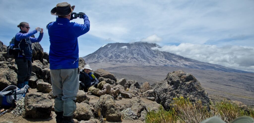 Hiking-Umbwe-route-while-taking-picture-of-Mt.-kilimanjaro