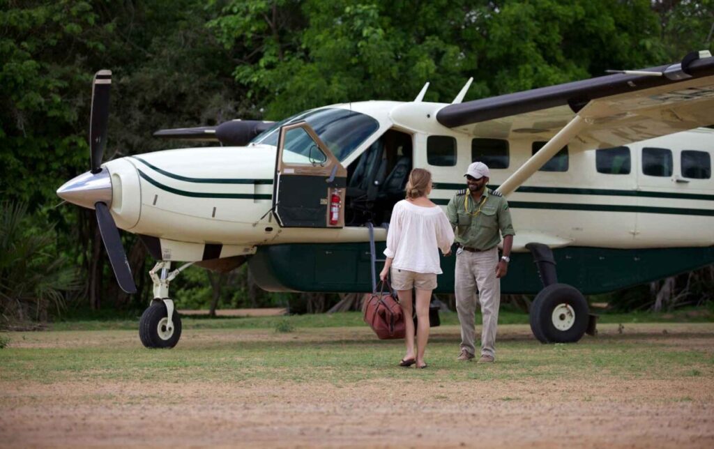 Tourist boarding p[lane on our 3 Days Serengeti Fly-in Safari Tanzania